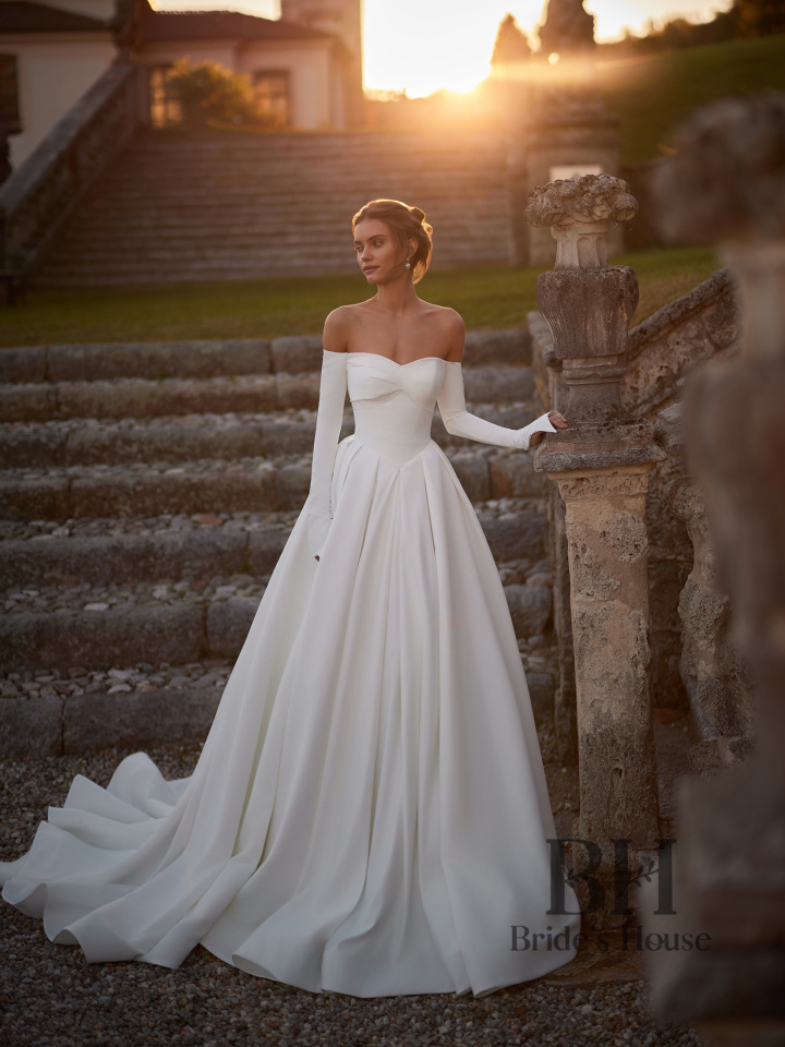 Laconic wedding dress with sleeves "Ivora"