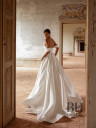 Dress embroidered with crystals with a detachable train “Elegant”